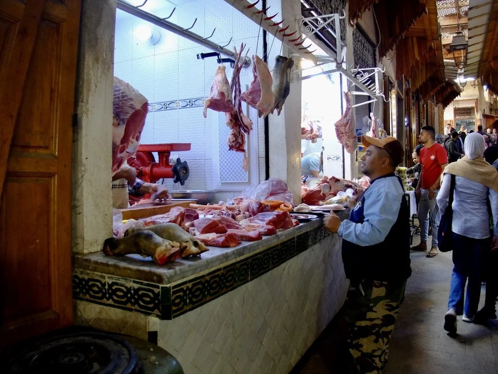  Meats are kept out on the counter to demonstrate that they are fresh.  Butchers never liked photos being taken. 