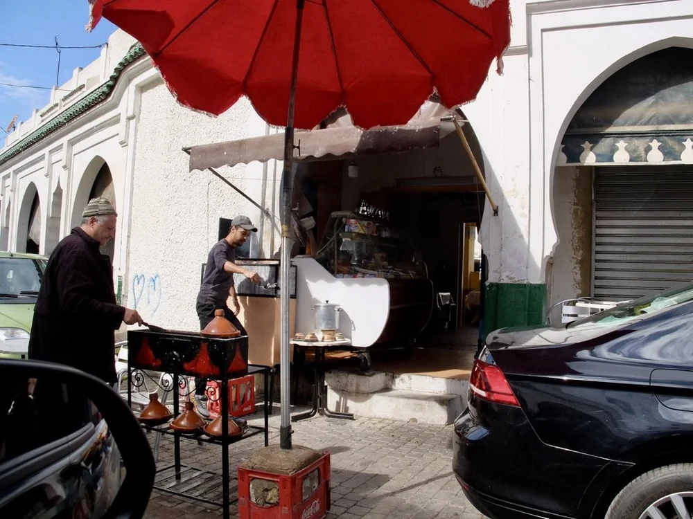  Meat grilled to order &amp; he’s readying tajines for the lunch crowd. 