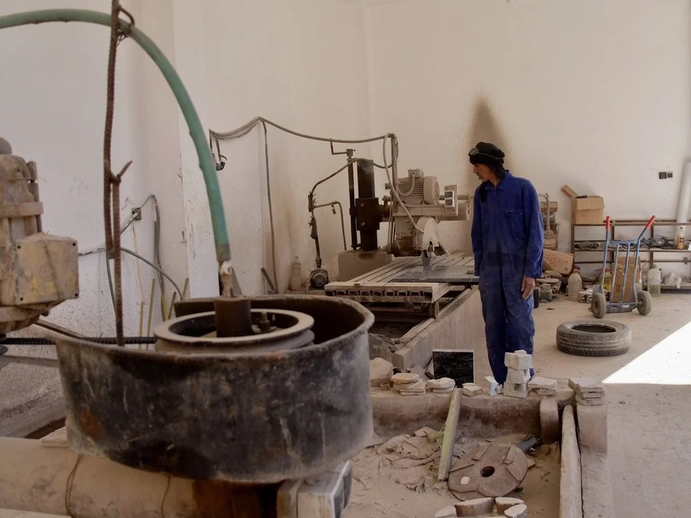   Mezane Fossil Factory, Rissani.   He had just cut some rock. 