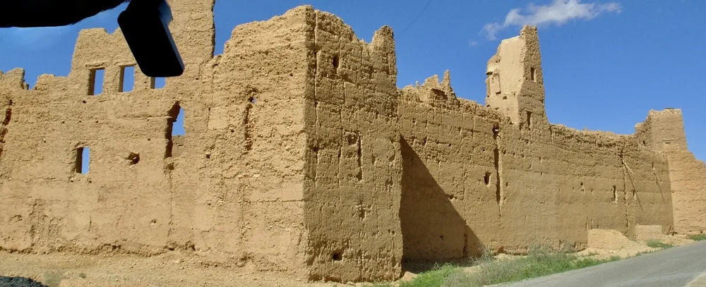  Maybe this abandoned structure was once a kasbah “where either the ruling sheik or king once lived, providing a high vantage point to watch for approaching and unwanted guests. &nbsp;Generally, they look like mud castles, coming in many shapes and s