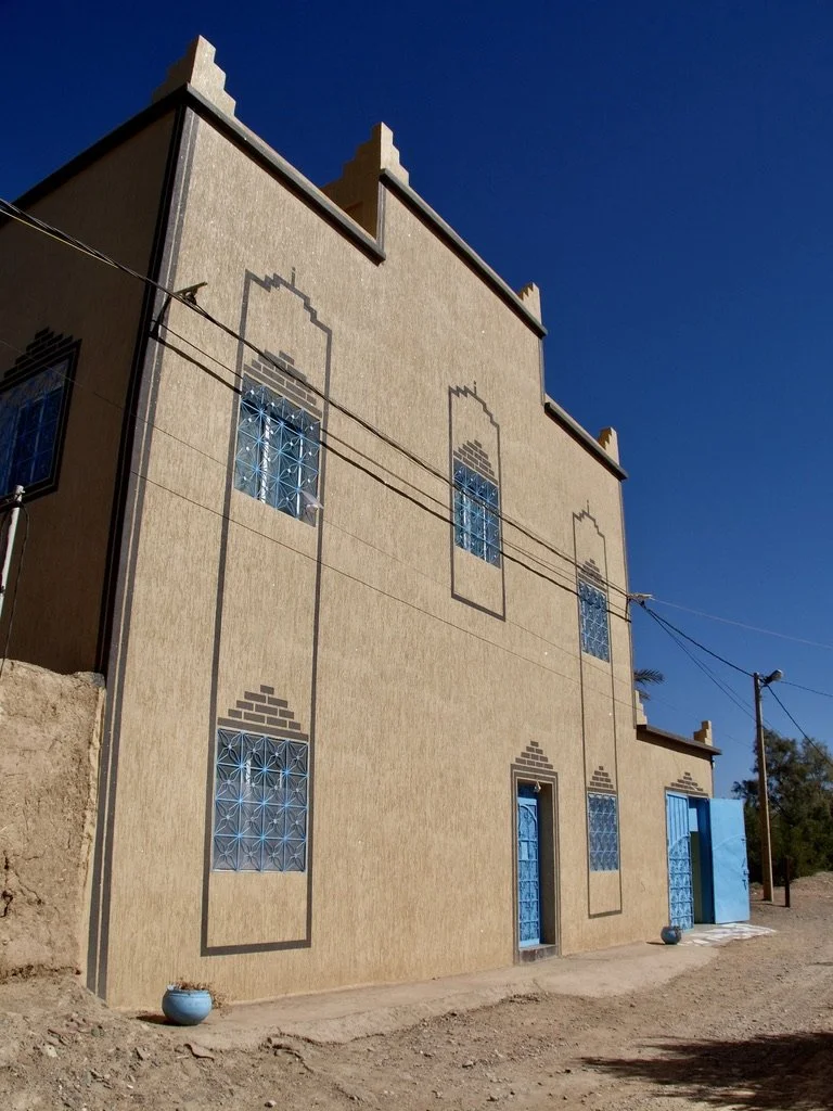  The open blue door on the right goes into a little bodega style store. 