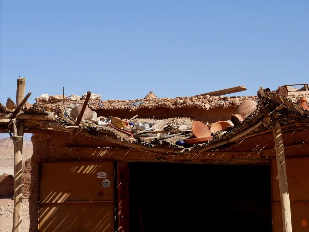 A snake charmer who had been entertaining tourists at the viewpoint, stayed in this structure.