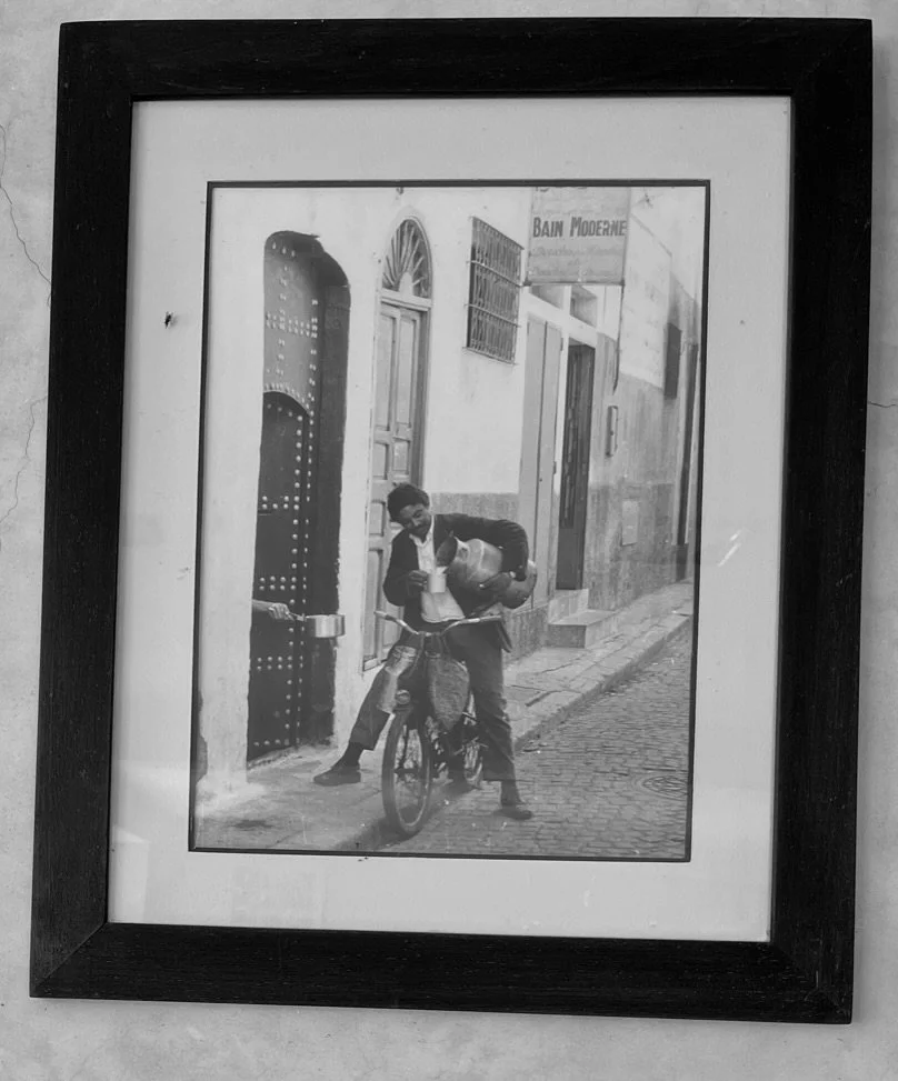  Milk seller going door to door.  One of many great photos on the walls of Café-restaurant Assanfou, Tizi N'Tichka. 