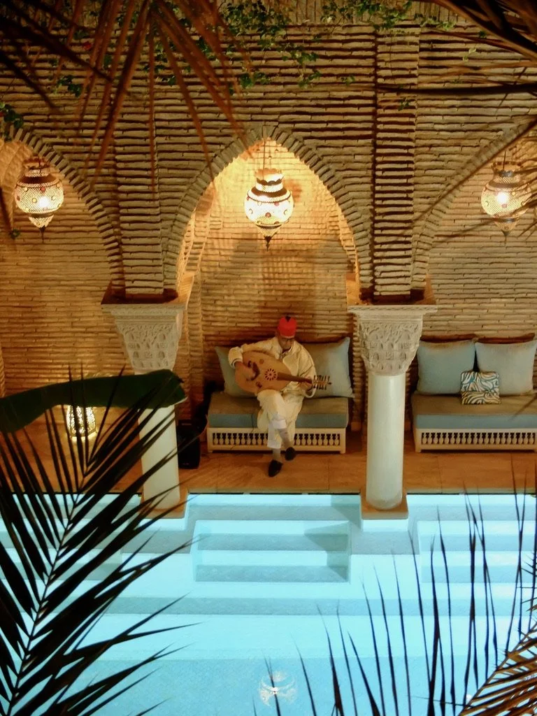  His music. played on his oud,  lulled us to sleep each night.