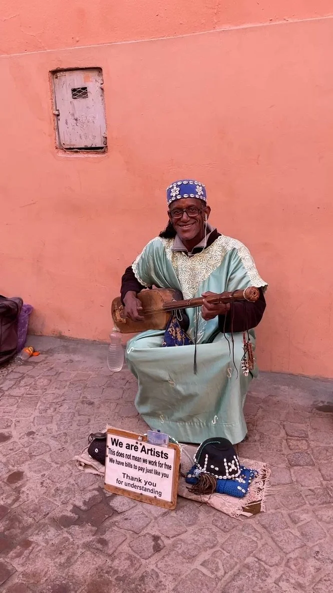  He moved his head to twirl the tassel. 