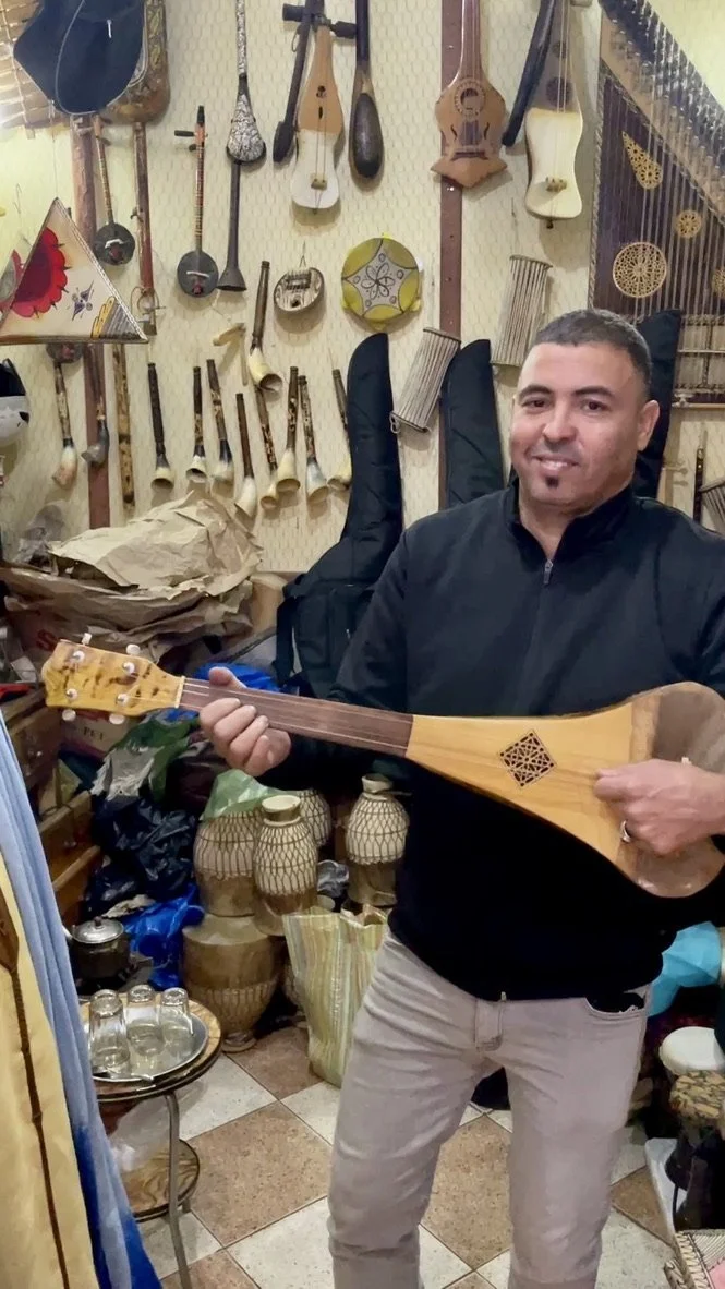  He made this instrument.  It was four strings so I tried it but it wasn’t tuned like an ukulele! 