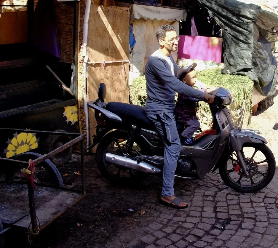 Dad put a helmet on before they took off but not on his son.