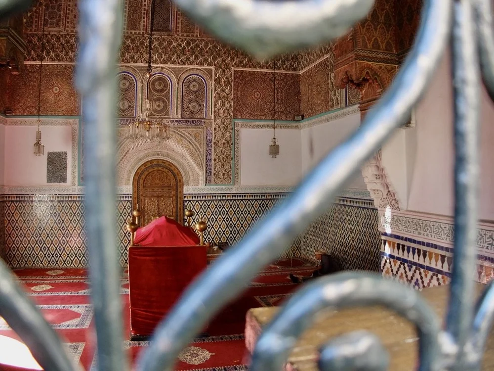 Some famous person's tomb with a caretaker.