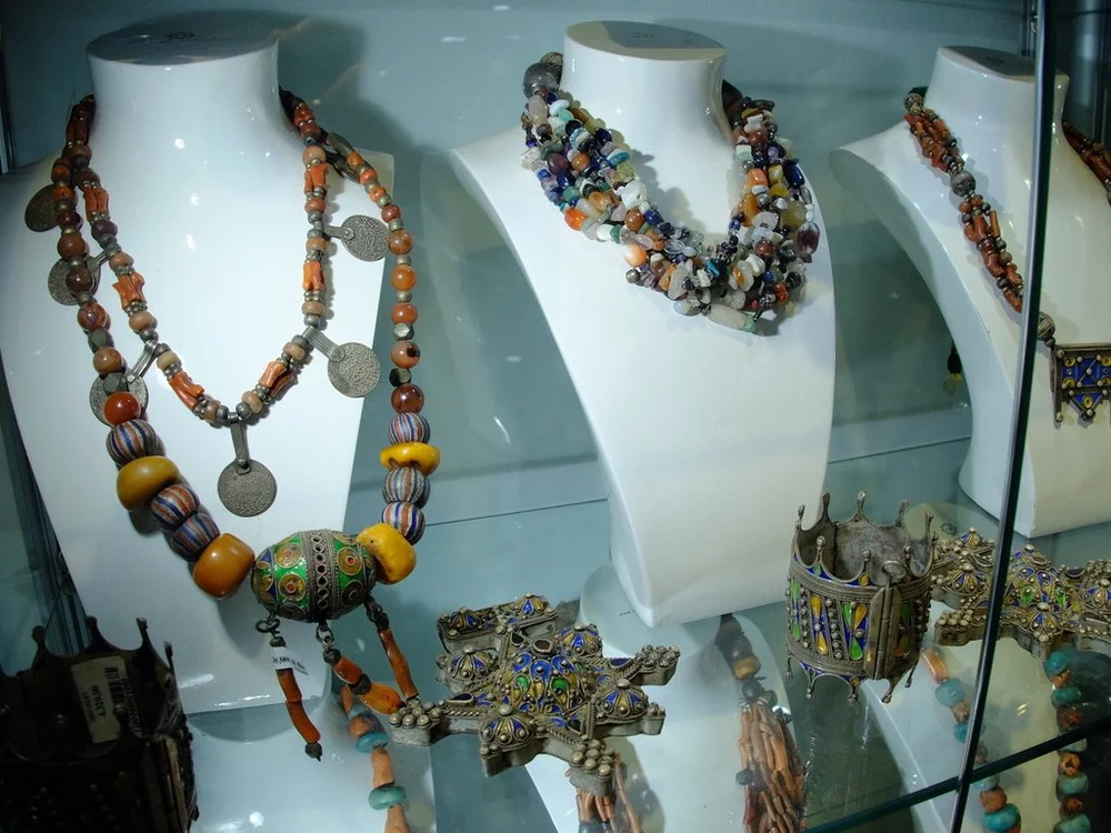  Dar Bouchaib.  Youssef suggested that we look in here on our own. The prices were non-negotiable. Items downstairs might be in our price range &amp; upstairs the museum quality pieces might be beyond us, but we should look. 