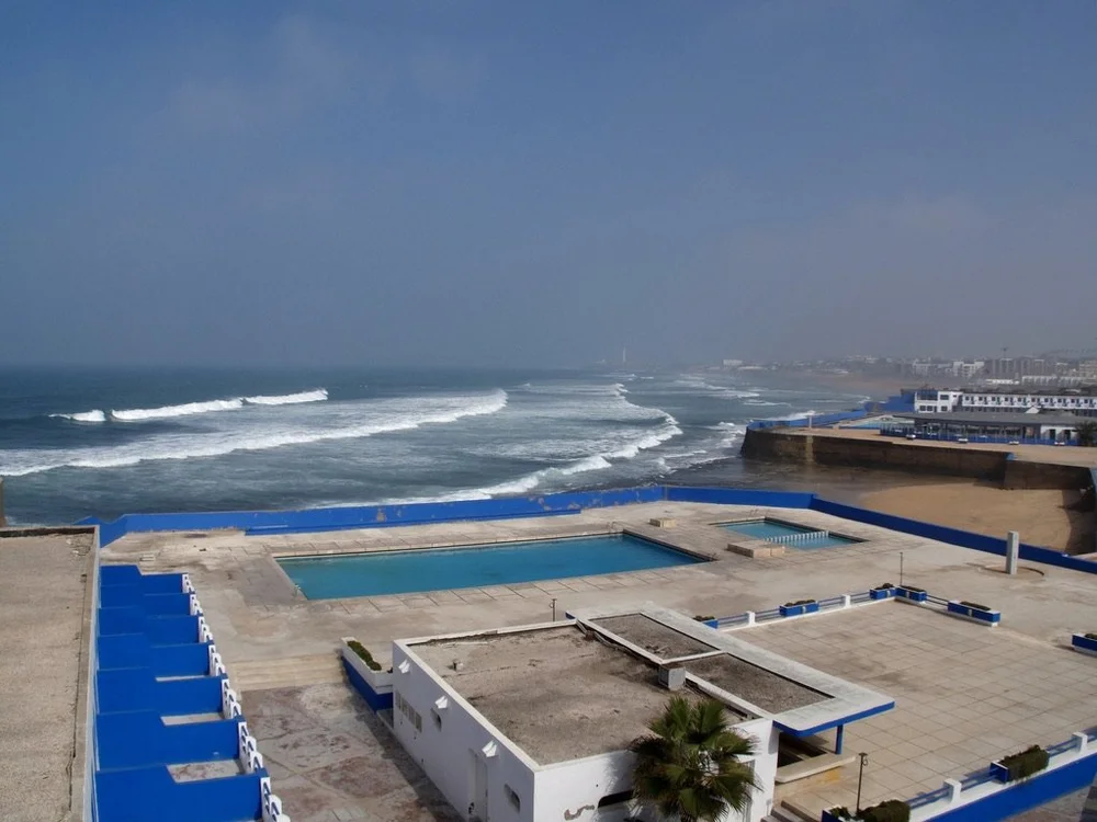 Through the haze you can spot (center of the screen) the 60 story high minaret of the Hassan II Mosque.