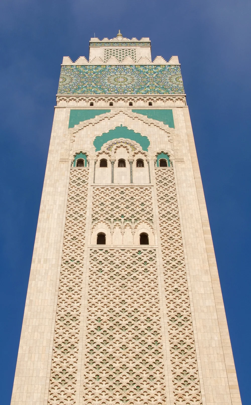  At night, a laser light at the top is directed towards Mecca.   