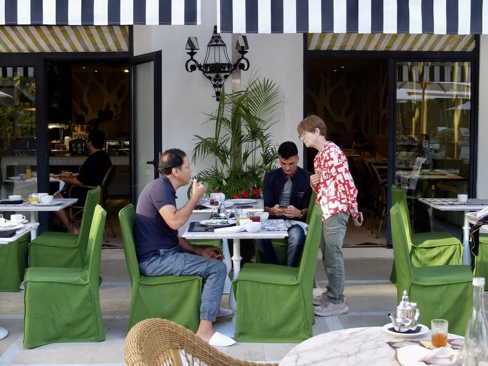  The breakfast area was filled with mostly men. We guessed that they were in Casablanca on business.  It was the day after the U.S. elections.  This fellow was a Moroccan who lived in France. He was extremely pleased with the outcome of the American 