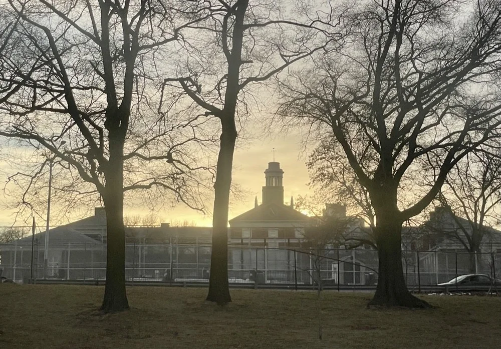  Forest Hills H.S.seen from taxi driving on the Long Island Expressway en route to Manhattan.  Forest Hills H.S. some distinguished alumni: Emily &amp; Howard Gannes, Paul Simon, Art Garfunkel, Jerry Springer, Michael Landon, Richard Berkof, Alice Ba