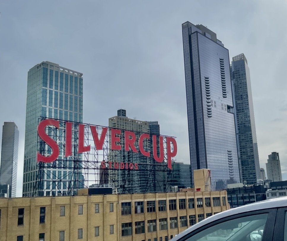  From a yellow cab drive entering Queens from the 59th St. Bridge.    “Silvercup Studios,  Queens c. 1983, is one of the largest film and television production facilities in New York City.” The SILVERCUP Bread Bldg c. 1929 &amp; neon sign c. 1962-62.