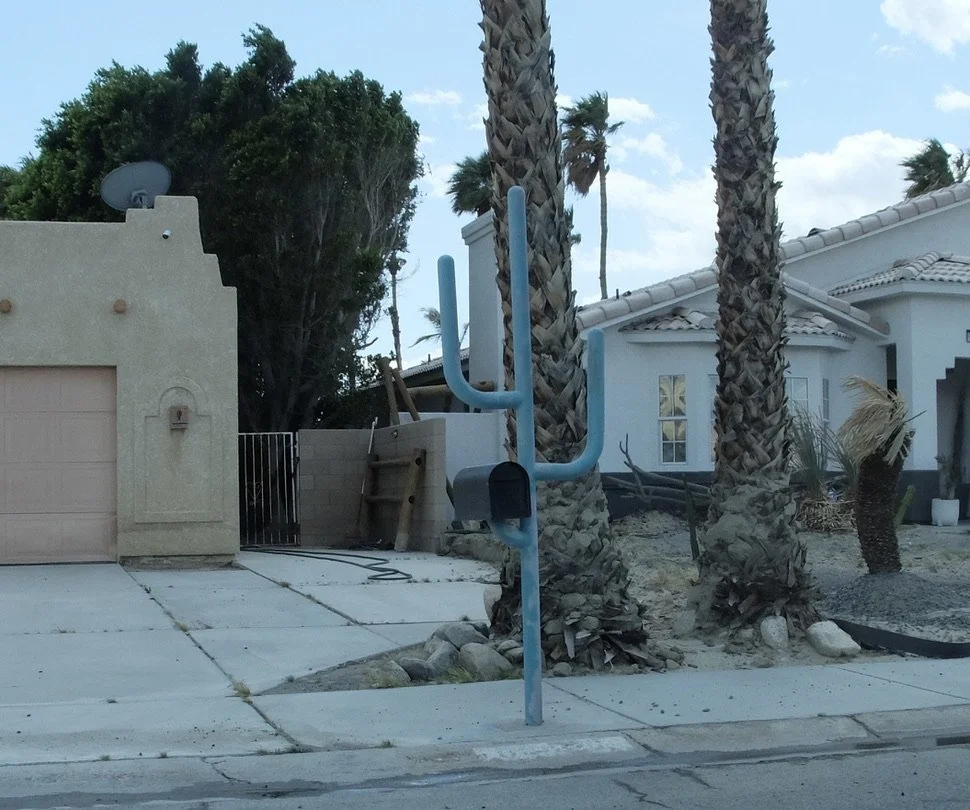 Saguaro castus shaped mailbox stand.  Palm Springs.