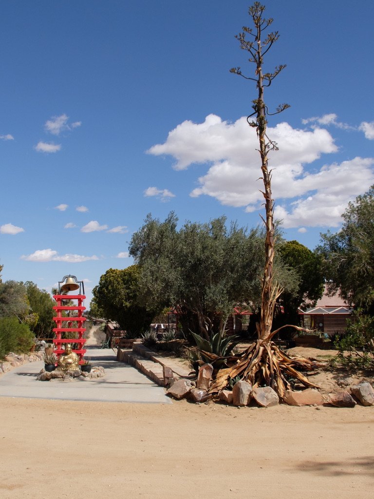 Behind the Buddha is the Silk Road Walking Path. I rang that bell every time I walked by it.