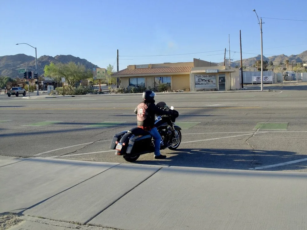  And there he goes.  Outside JT Country Kitchen. 