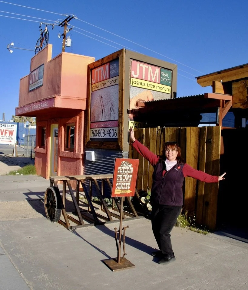  Through the window of the JT Country Kitchen, I had seen Tracy dancing as she put up that sign. She was happy to dance for the photograph. 