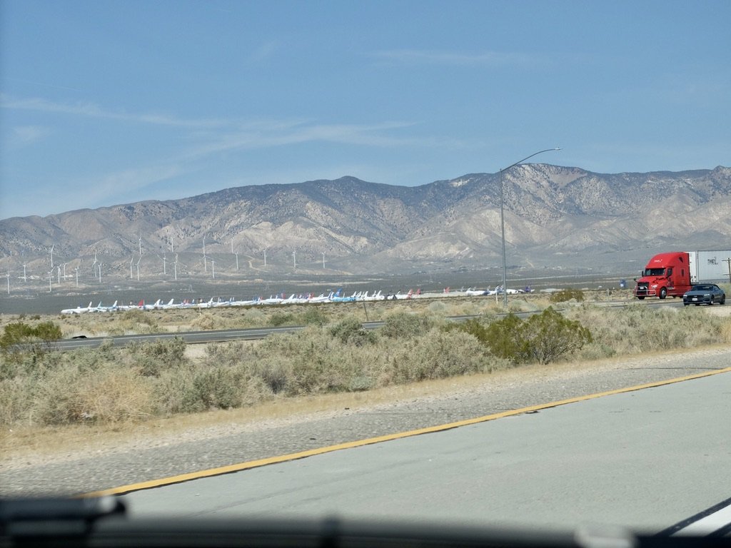 MTM | The Mojave Transportation Museum Foundation. “…a museum to preserve Southern California aviation, railroad, automobile and animal transportation history and culture.” It was closed. I was disappointed. And a red cab semi-trailer truck.