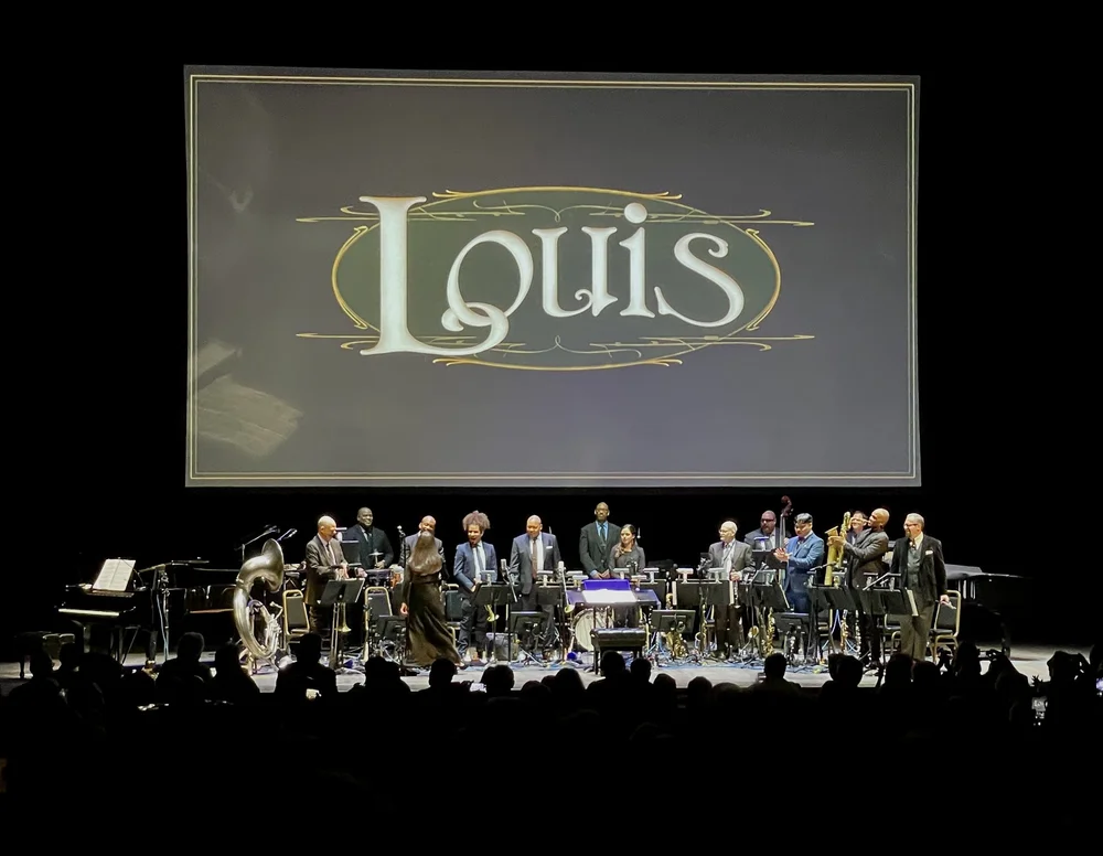  The appreciative audience was mixed race &amp; generations.  The musicians were superlative. We heard some of the best jazz solos ever. For example, the baritone sax player was phenomenal, etc. During the applause the pianist shook hands with the mu