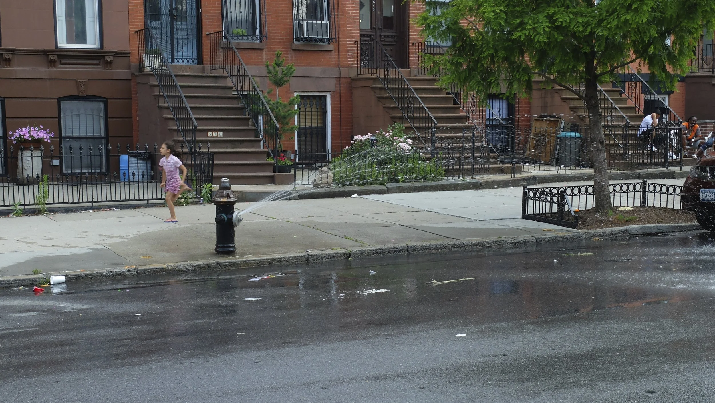 NYC has made available controlled flow covers so people can open the hydrant for summer time cooling & not waste a lot of water. Prospect Hts., Brooklyn, NY