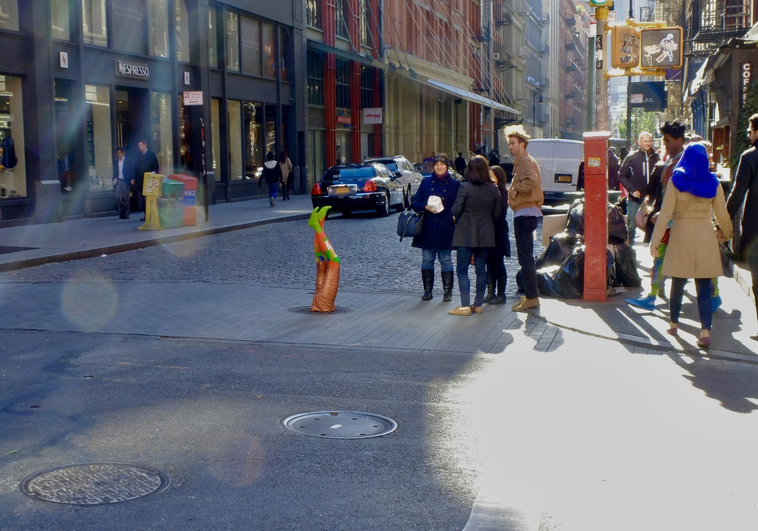 A Manhattan manhole cover with an objet d’art.