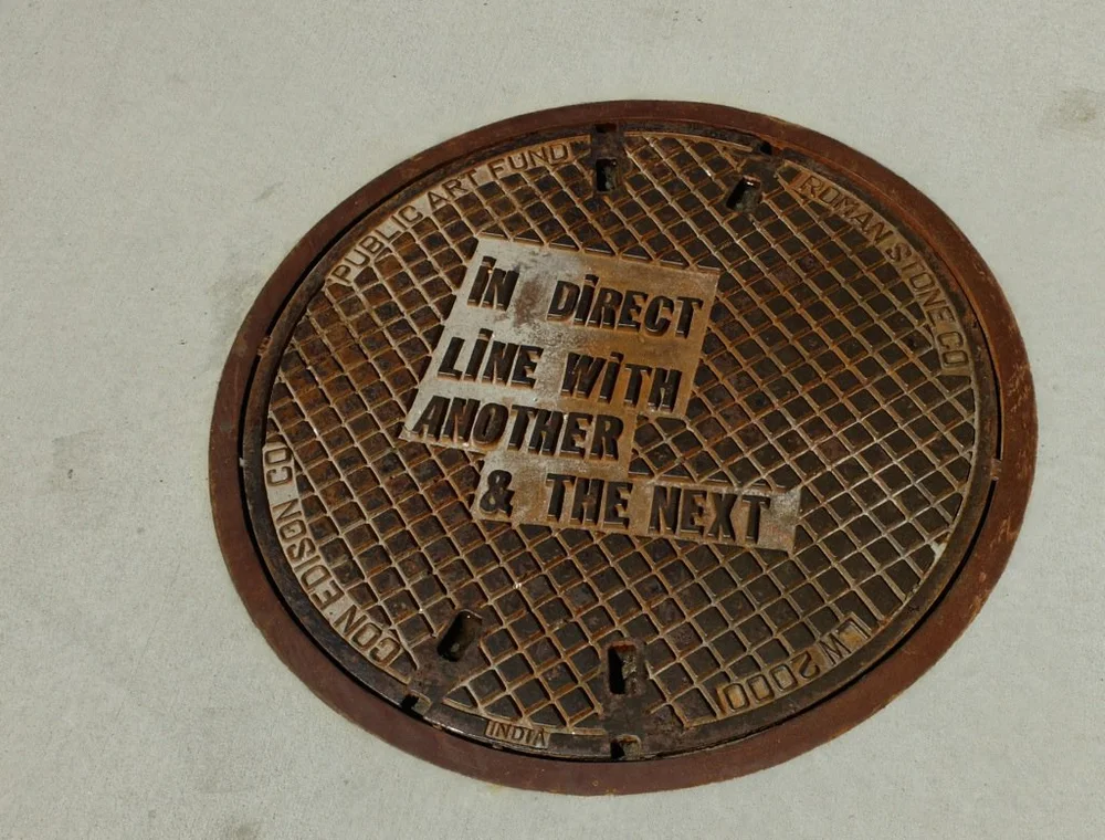  Sidewalk along side the Whitney Museum of American Art, NY,NY. Note that to cover is made in India as are most now.  And some in Mexico. 