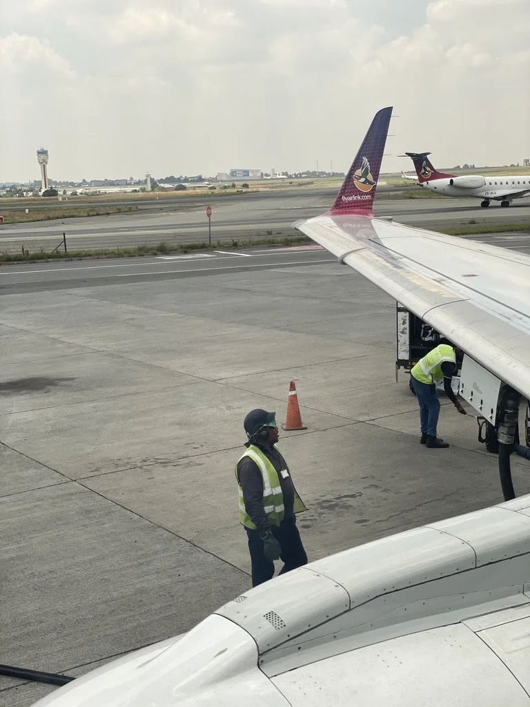  O.R. Tambo International Airport, Joburg, ZA.  Our flight was to Kasane International Airport, Botswana.  The airport was mentioned in the book Naomi &amp; I were reading,  A Carrion Death  by Michael Stanley. 