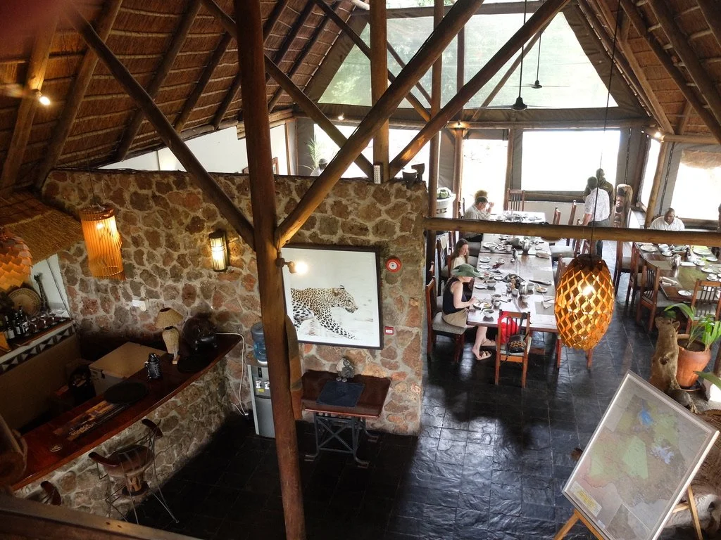  The dining was communal at Muchenje Safari Lodge, Chobi River, Kasane, Botswana.  The guides joined us for meals.  The lodge staff work 20 days on (24/7) &amp; then ten days off.  While working, they wear many hats around the lodges. The people appr
