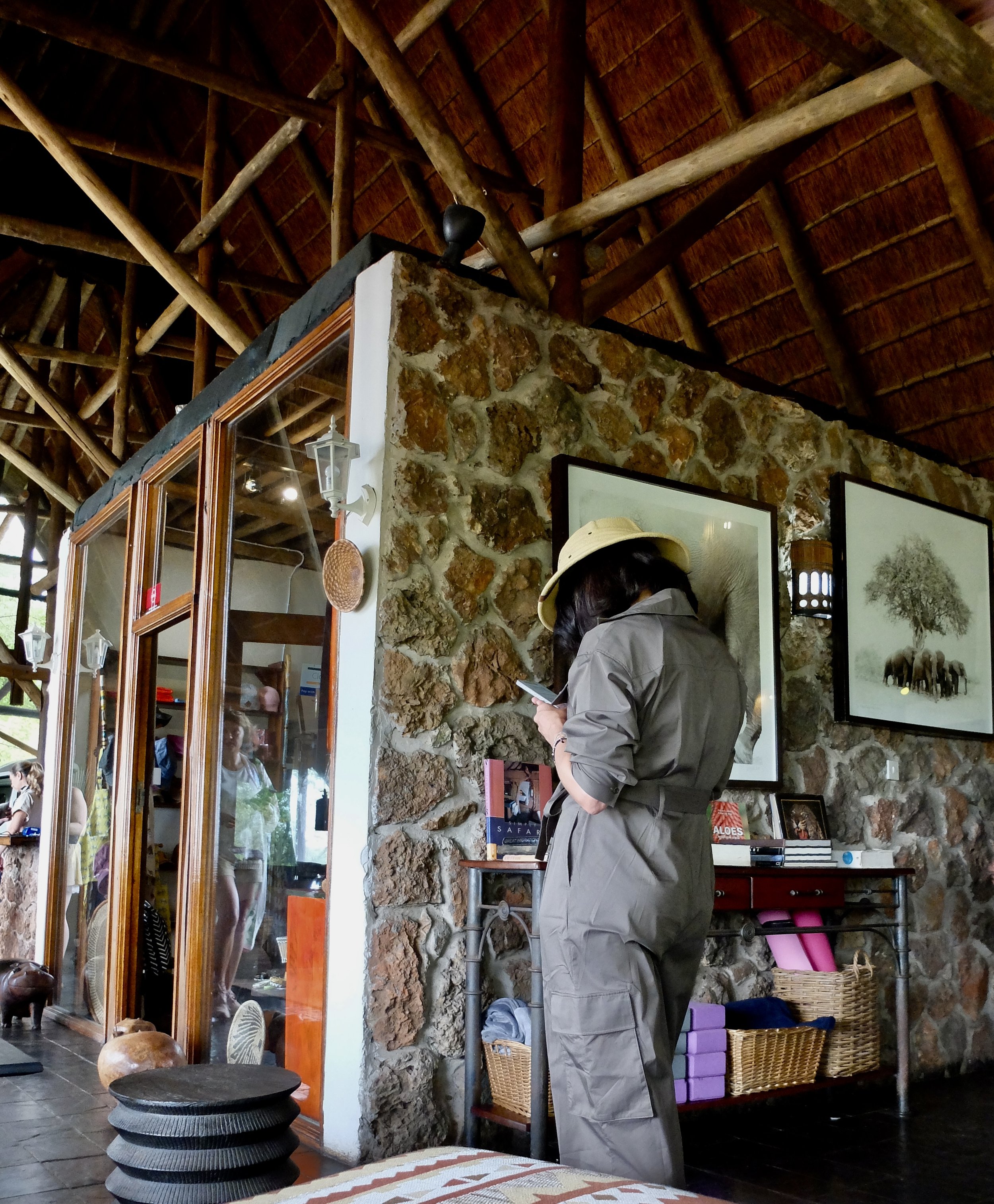 A Russian tourist in her brand, spankin’, new safari outfit.  Thankfully they were departing.    Muchenje Safari Lodge, Chobi River, Kasane, Botswana. 