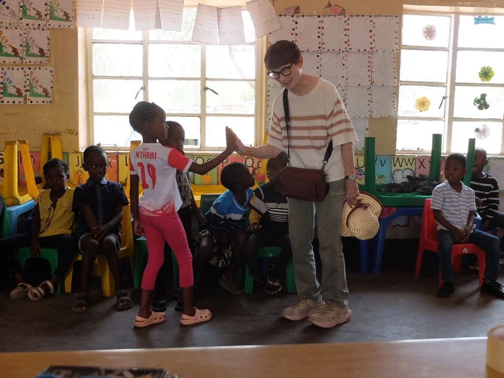  Mabele Primary School in Chobe District, Botswana.  The kids loved Nomi’s hair &amp; wanted to touch it. 