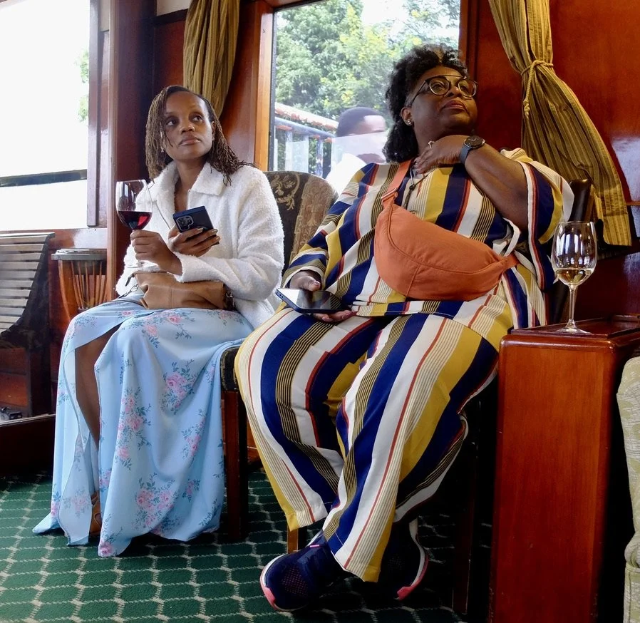  I couldn't resist. I used my best subtle subway photo technique as inspired by Walker Evans. I had to wait until the younger gal stopped using her iPhone.  But this was not on a subway. It was in ca. 1923, lovingly restored&nbsp;Victoria Falls Steam