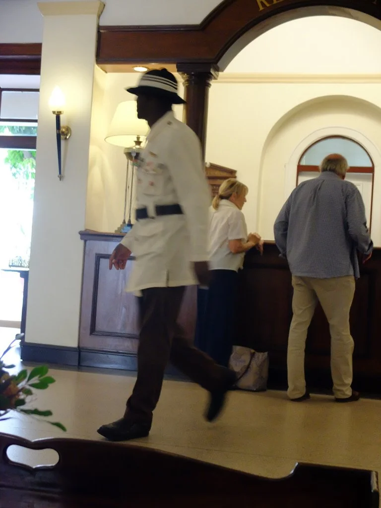  I loved the uniform of the bellhops at the Victoria Falls Hotel.  He had the front of his uniform covered with pins that tourists had given him from their countries.  