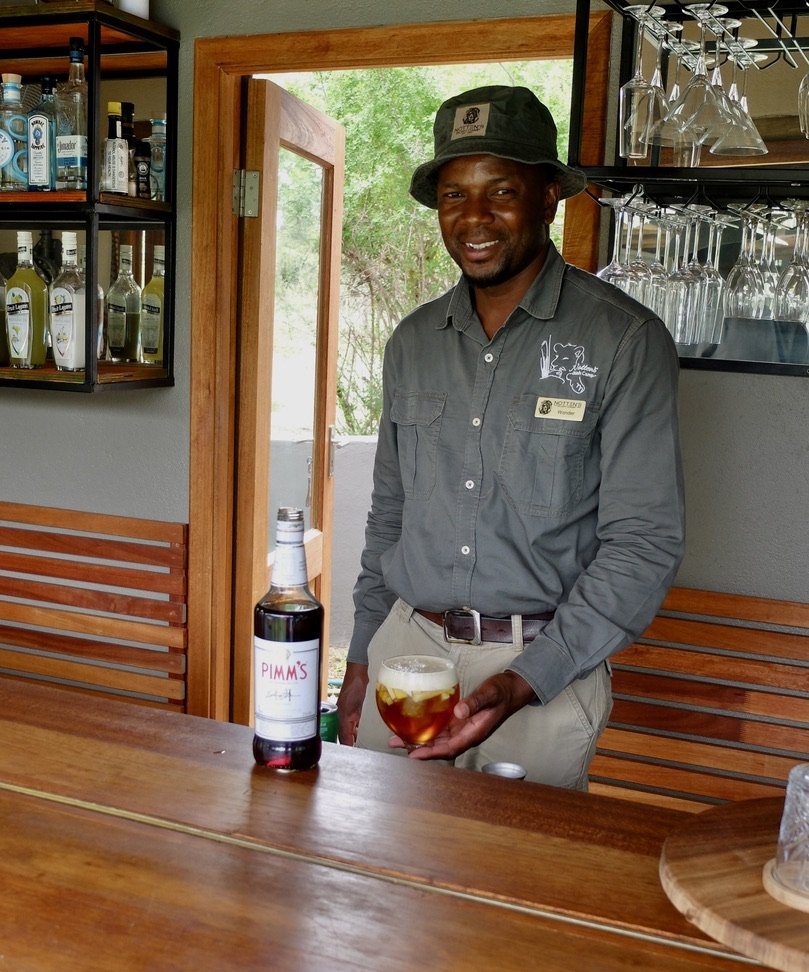  I meandered over to the pool where, wearing a different hat, Wonder was tending bar.  Some of the folks used names like Wonder to made it easier for tourists but that was his name as was that of our Victoria Falls guide, Precious.  Other people we e