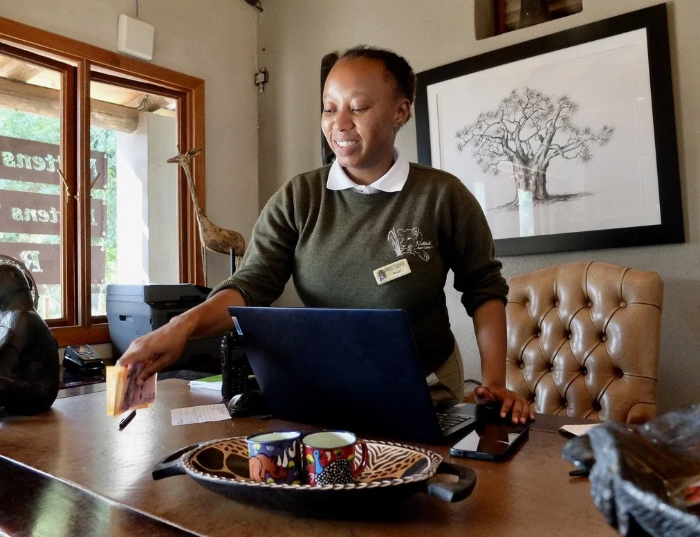  Of course “doing some damage” at the lodge shop.  Notten's Bush Camp, Sabi Sands Nature Preserve, South Africa. 