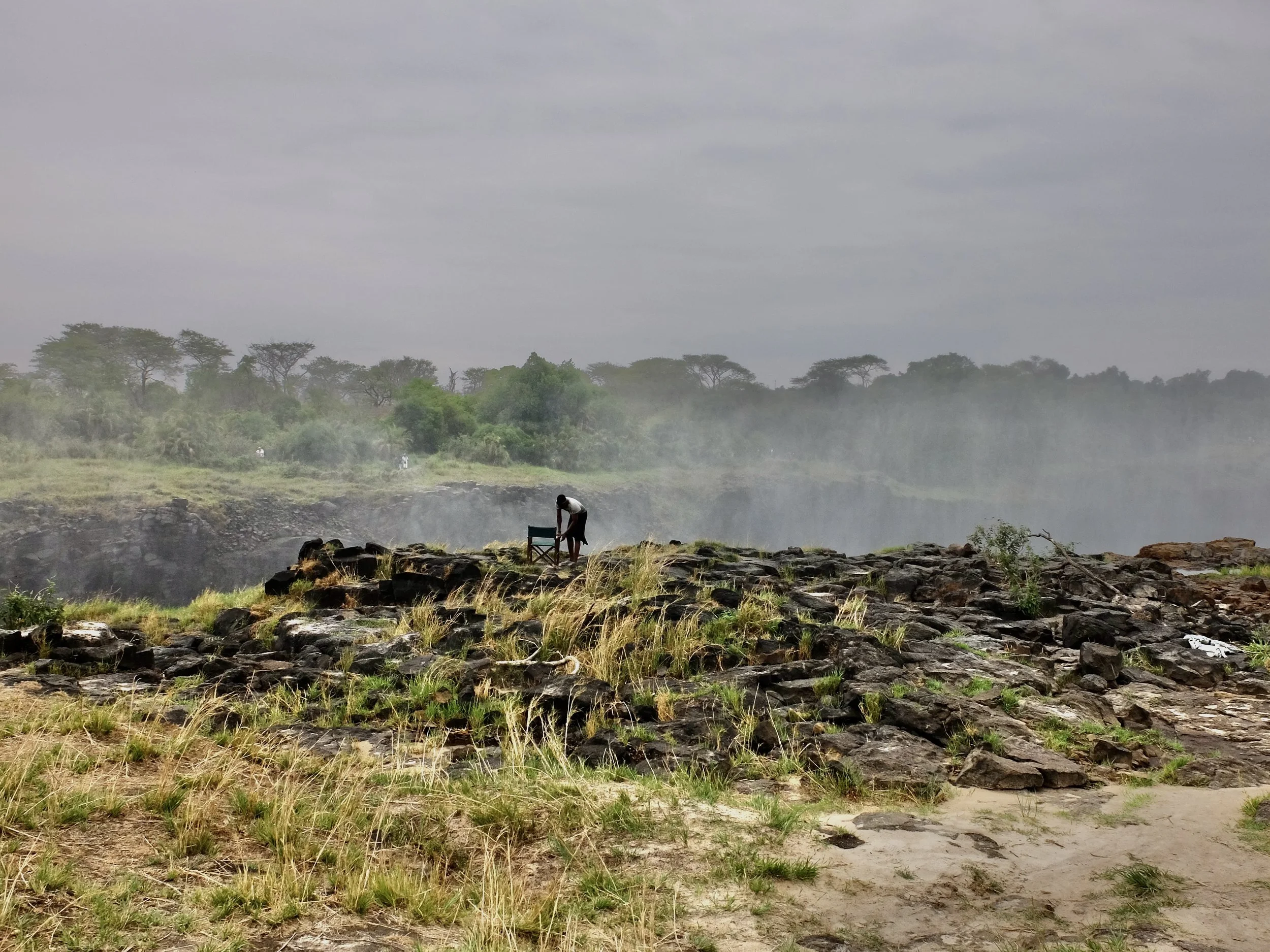 Collins had another fellow setup a chair for me on the precipice of one of the gorges.    Livingstone Island, Victoria Falls, Zambia. 