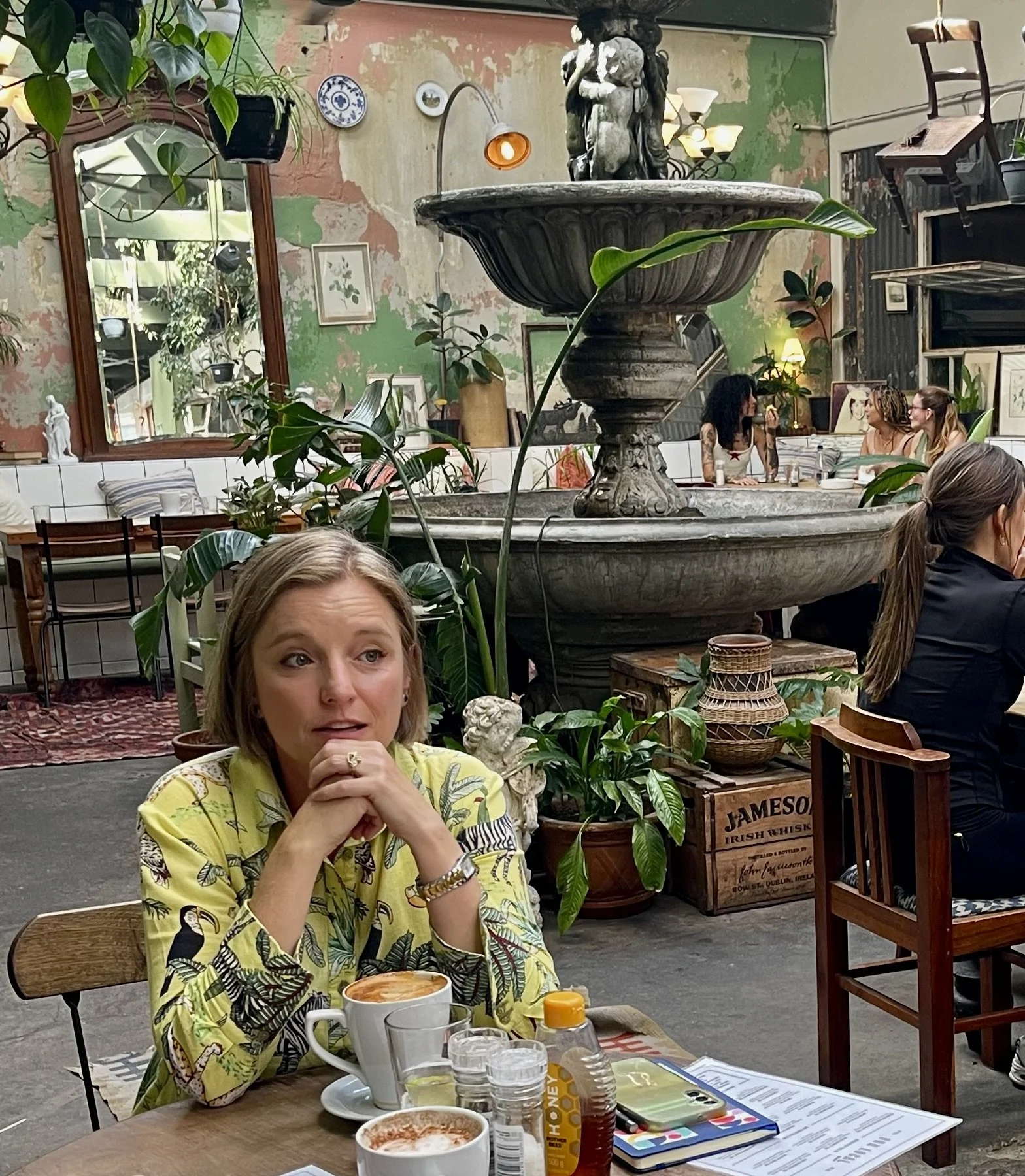  Photo by Nomi at Our Local breakfast restaurant in Capetown.  We were both intrigued by this woman’s dress.  Nomi did talk with her.  Cape Town Eats Tour with Karen Schmidt. 