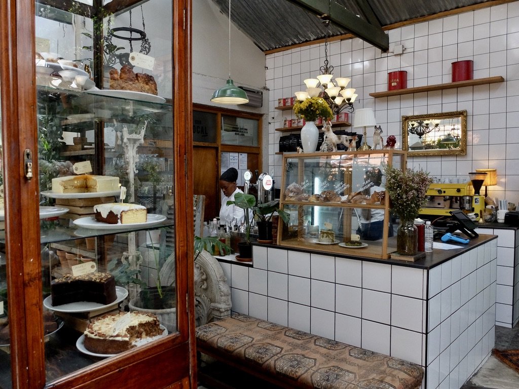  She was one of many very busy baristas at  Our Local breakfast restaurant in Capetown.  Cape Town Eats Tour with Karen Schmidt. 