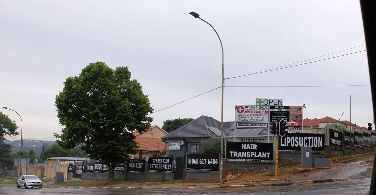  Signs &amp; graffiti abound.  Or, “You can get it if you really want.”  Joburg, ZA. 