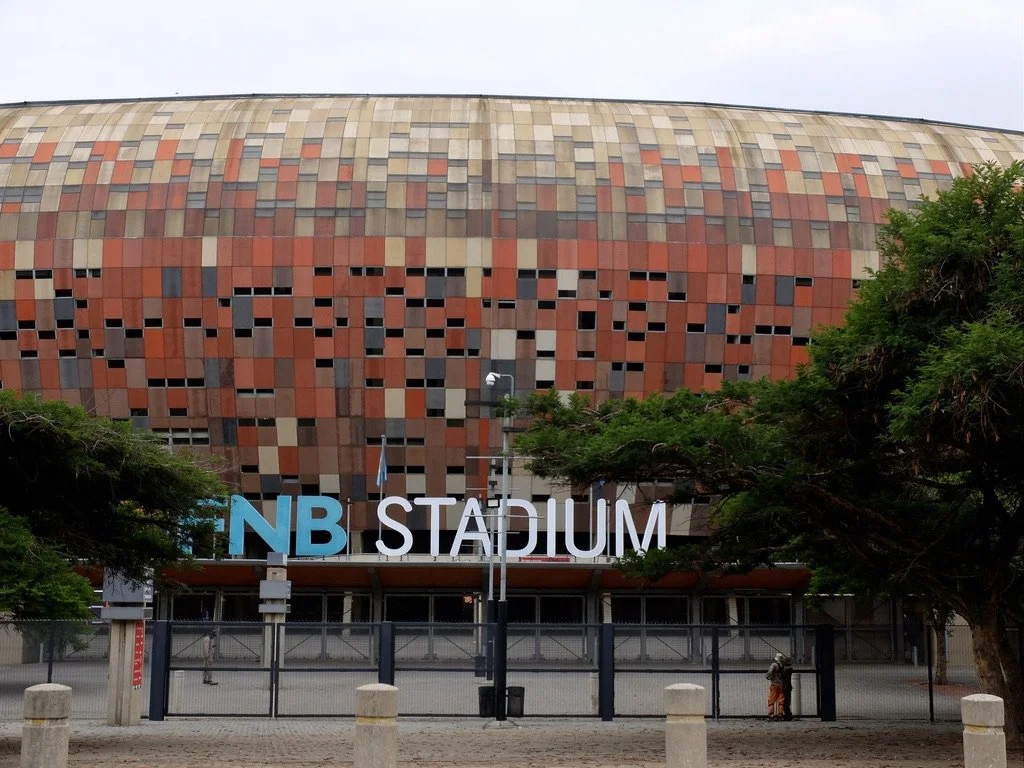  FNB Stadium holds 94,700 &amp; hosted the 2010 FIFA World Cup The World Cup.  Joburg, ZA. 