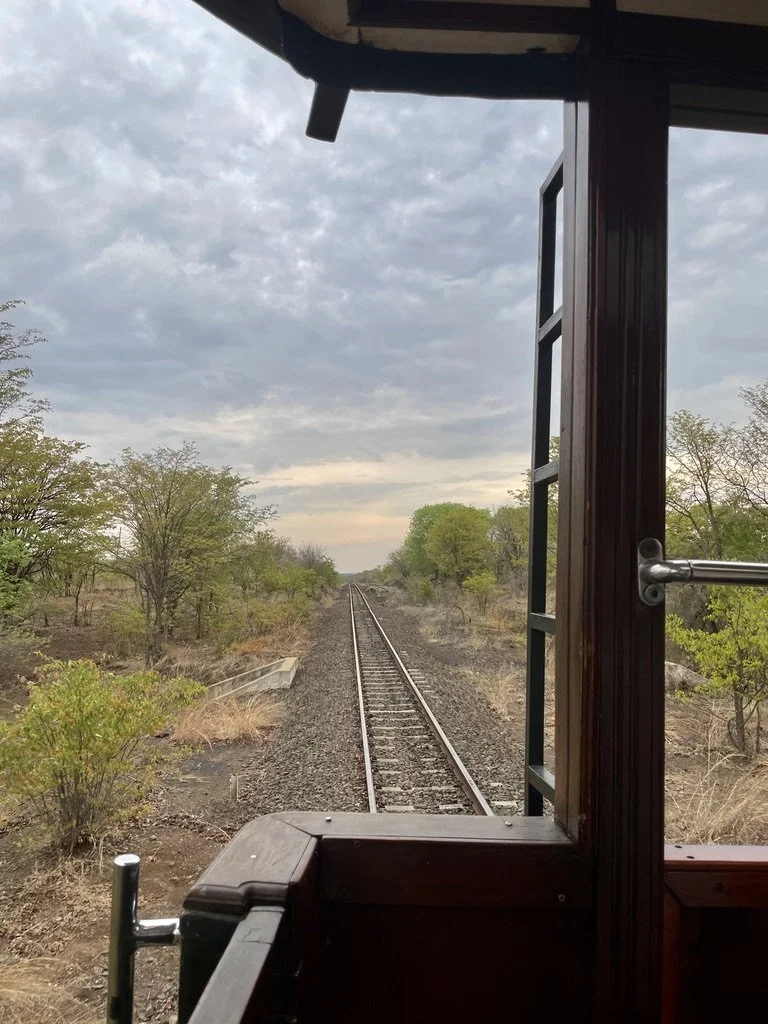  The Victoria Falls Royal Steam Train proceeded backwards from the 1902 Mphamvu Livingstone Depot to the Victoria Falls Bridge.  The view from the rear platform was perfect.  This is the railroad line that Cecil Rhodes hoped would go to Cairo. 