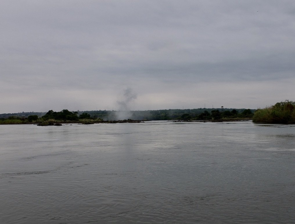  Mist from the falls seen on the Zambezi River as we approached Livingstone Island.   At Niagara Falls, NY, that mist was referred to as fumaroles.  