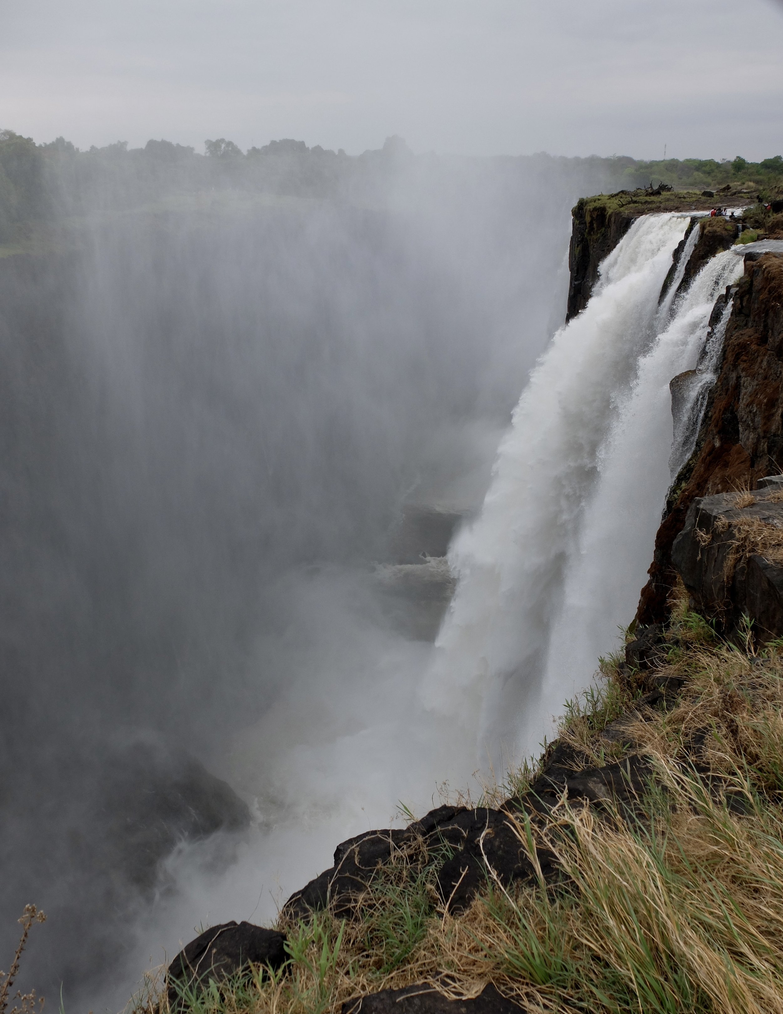  Note the people on top of the falls, in the upper right of the photo.  They are at the Devil’s Pool.  We decided not to go there as my leg &amp; balance would have made it too dangerous.   