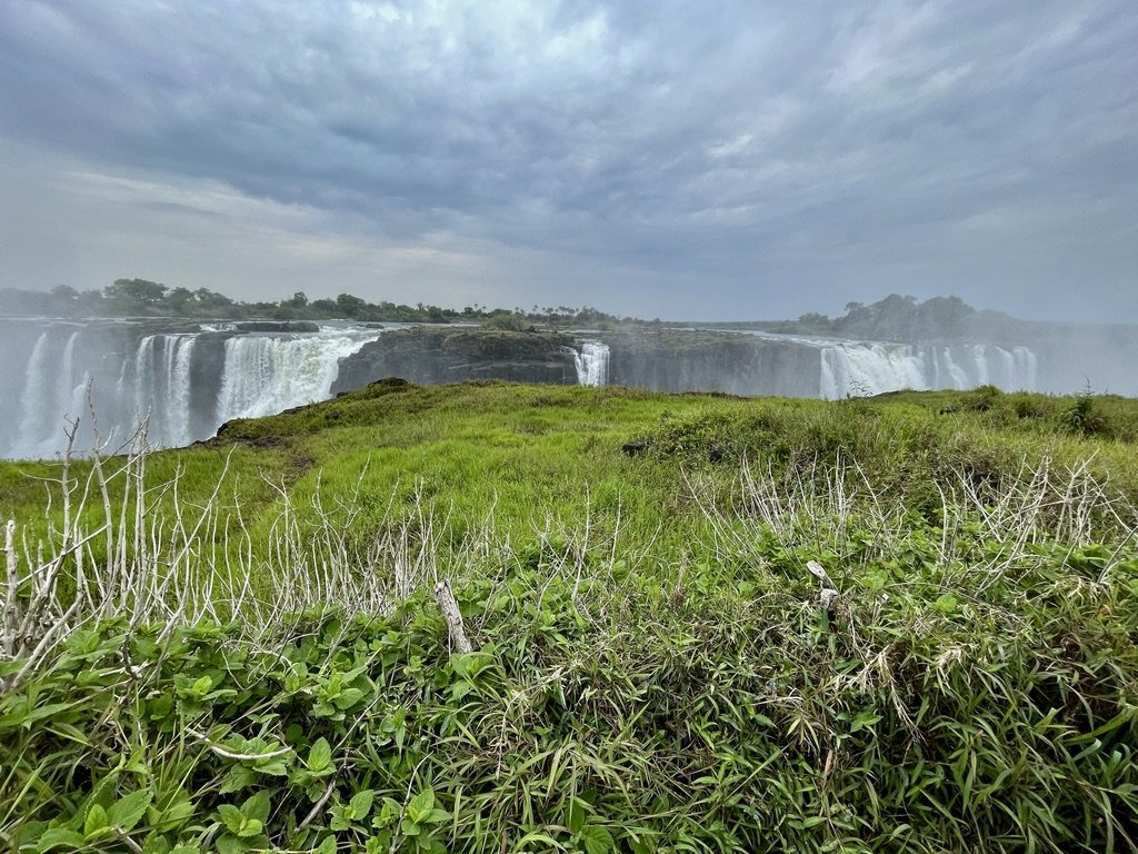  View from the Zimbabwe side path the next day.  At the height of the winter rainy season we’d be looking at a wall of water &amp; mist.  Victoria Falls Nat'l Park RAINFOREST a UNESCO World Heritage Site, Zimbabwe. 
