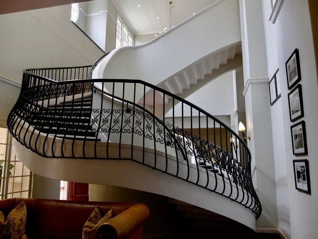  The Victoria Falls Hotel, “built by the British in 1904, was originally conceived as accommodation for workers on the Cape-to-Cairo railway.” 