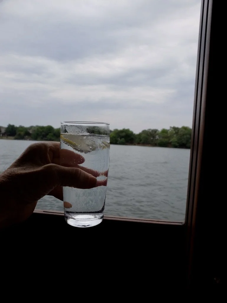  Savoring a G &amp; T on our Ru-ikane Sunset Cruise on the Zambezi River. 