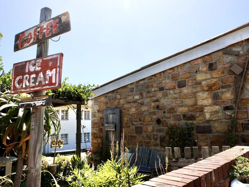  Howie called this the “Hole in the Wall Coffee.”  there was an opening in te wall through which one could order.  Simonstown, South Africa. 