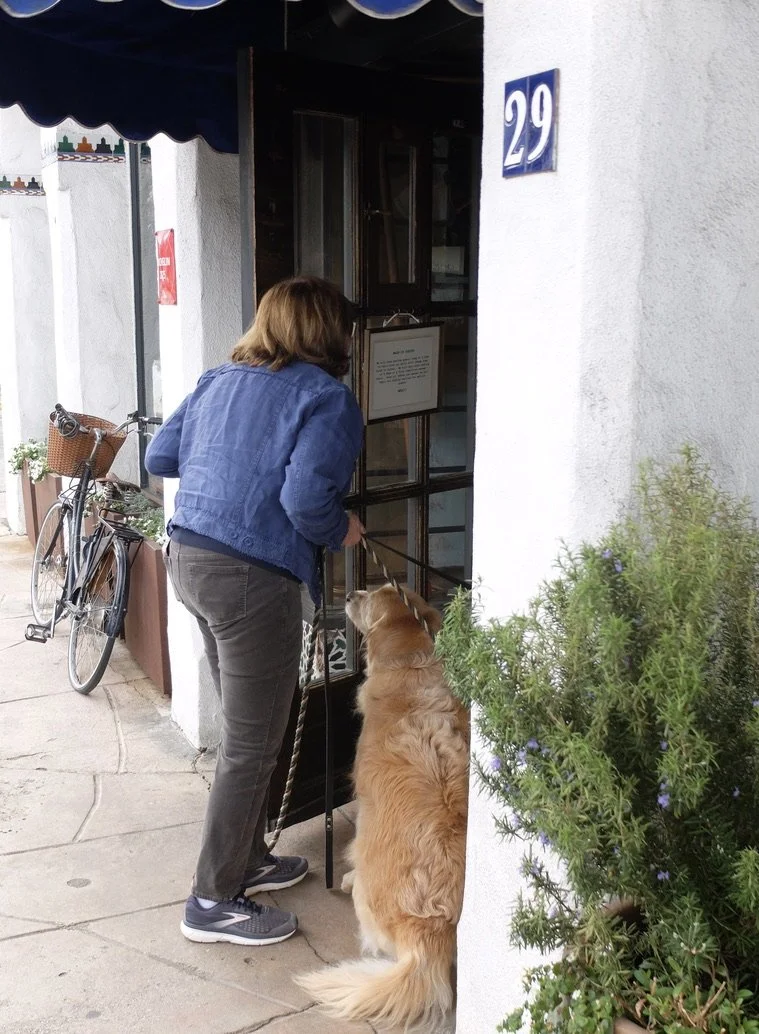  With her two huge gold retrievers she was oblivious as she blocked our entrance to La Bicyclette.  Carmel-by-the-Sea, CA. 