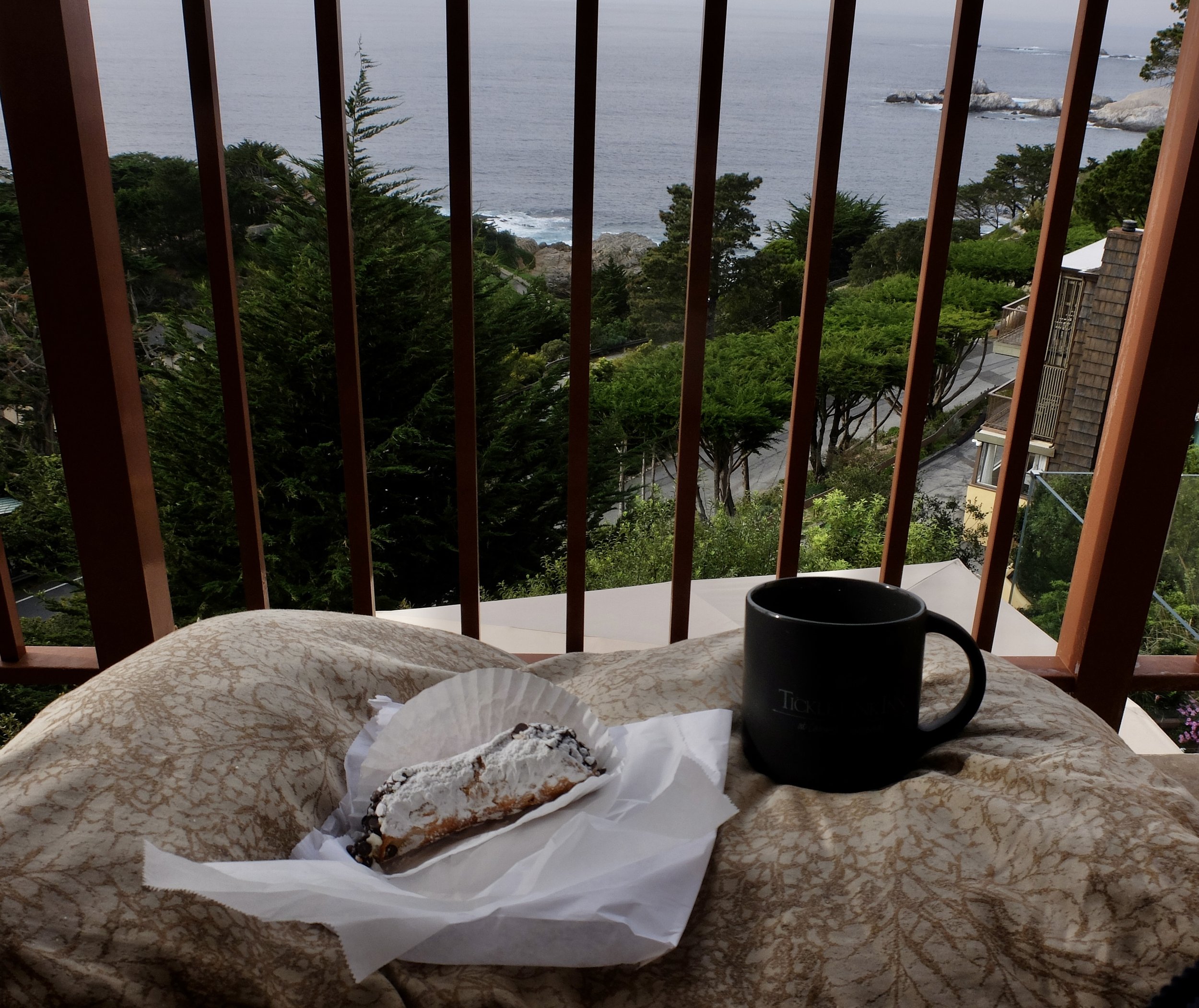  I drooled when I saw the cannoli in the window of a Sicilian bakery in Carmel.  When Nomi walked back to get the MINI to pick me up at the bottom of Ocean Ave, she got it for me.    From our balcony at the Tickle Pink Inn, Carmel Highlands, CA. 