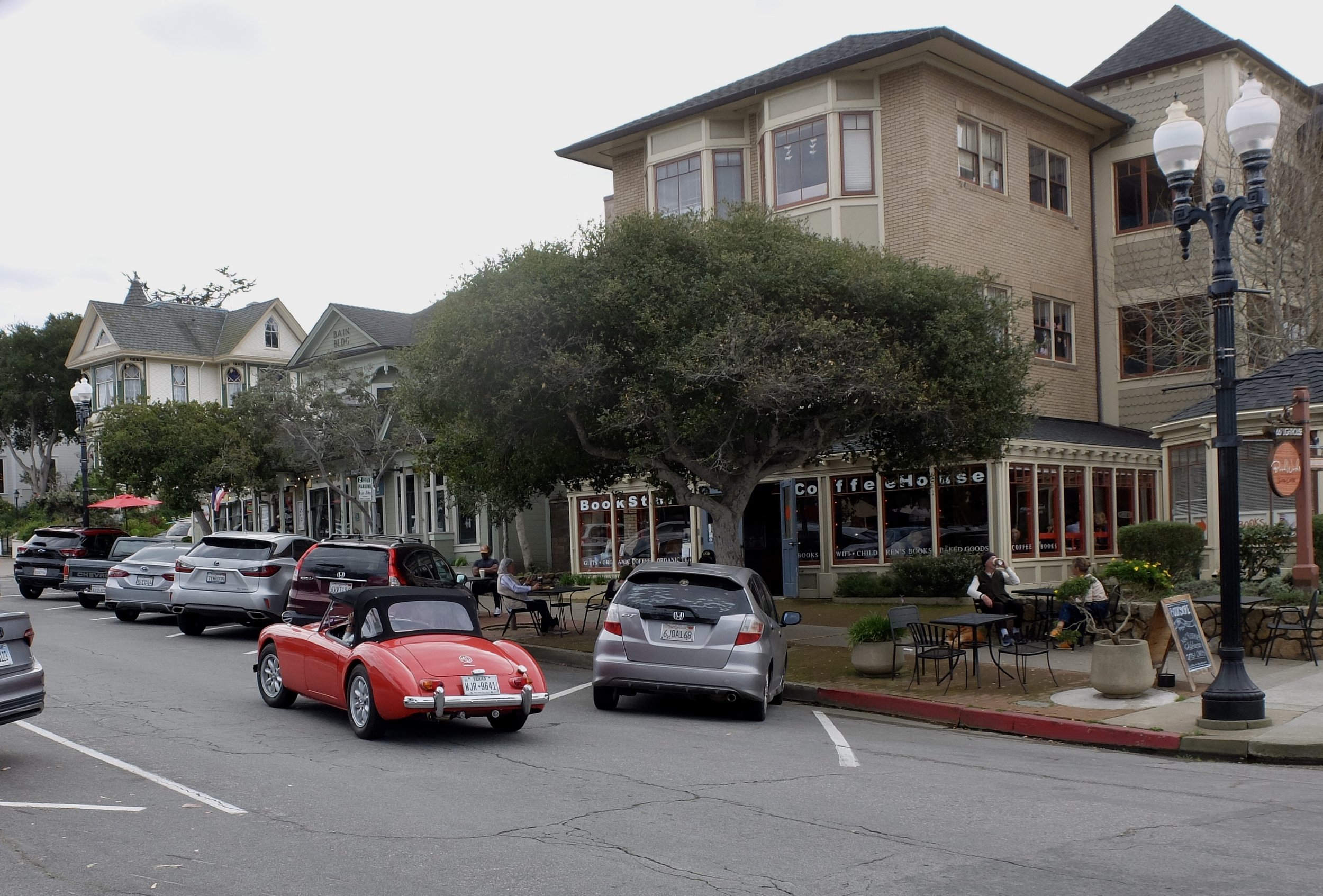  Oh boy, an MGA in Pacific Grove.  I couldn’t hobble across the street fast enough to meet the driver.    That bookstore was wonderful.  Lighthouse Avenue, Pacific Grove, CA. 